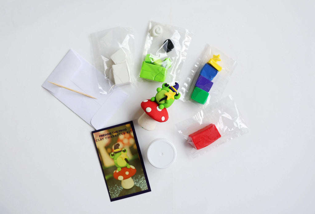 Colorful clay models and packaging on a white background