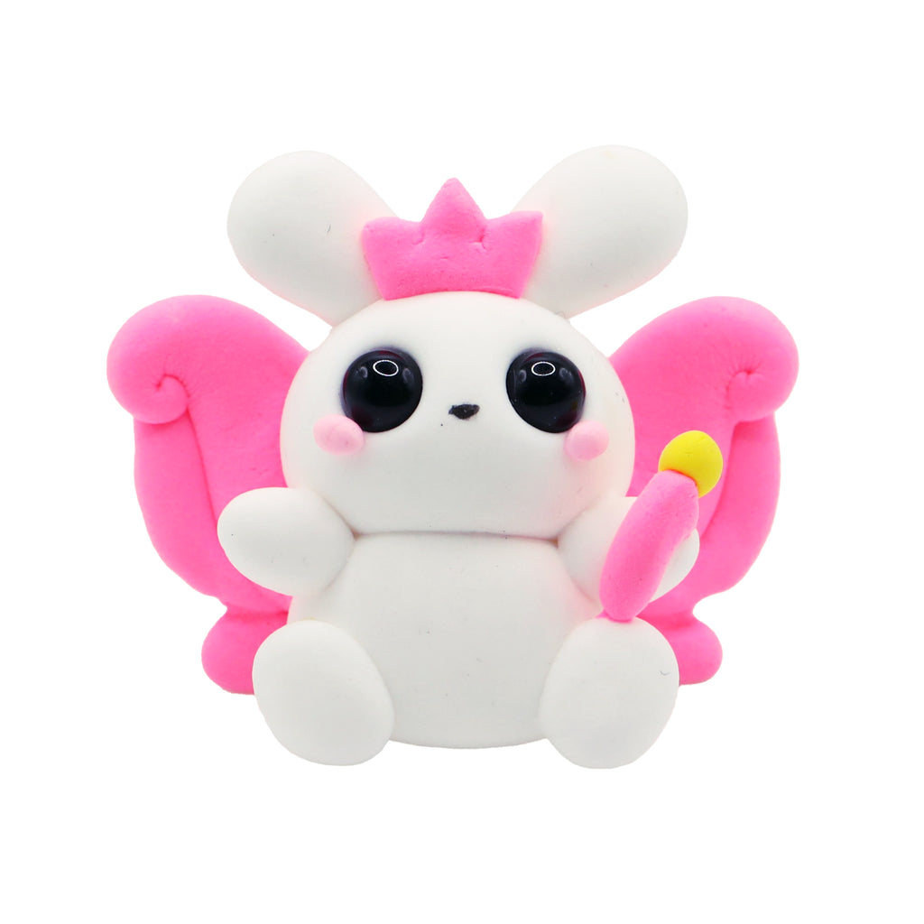 air dry foam clay bunny with pink wings and a yellow bow on a white background