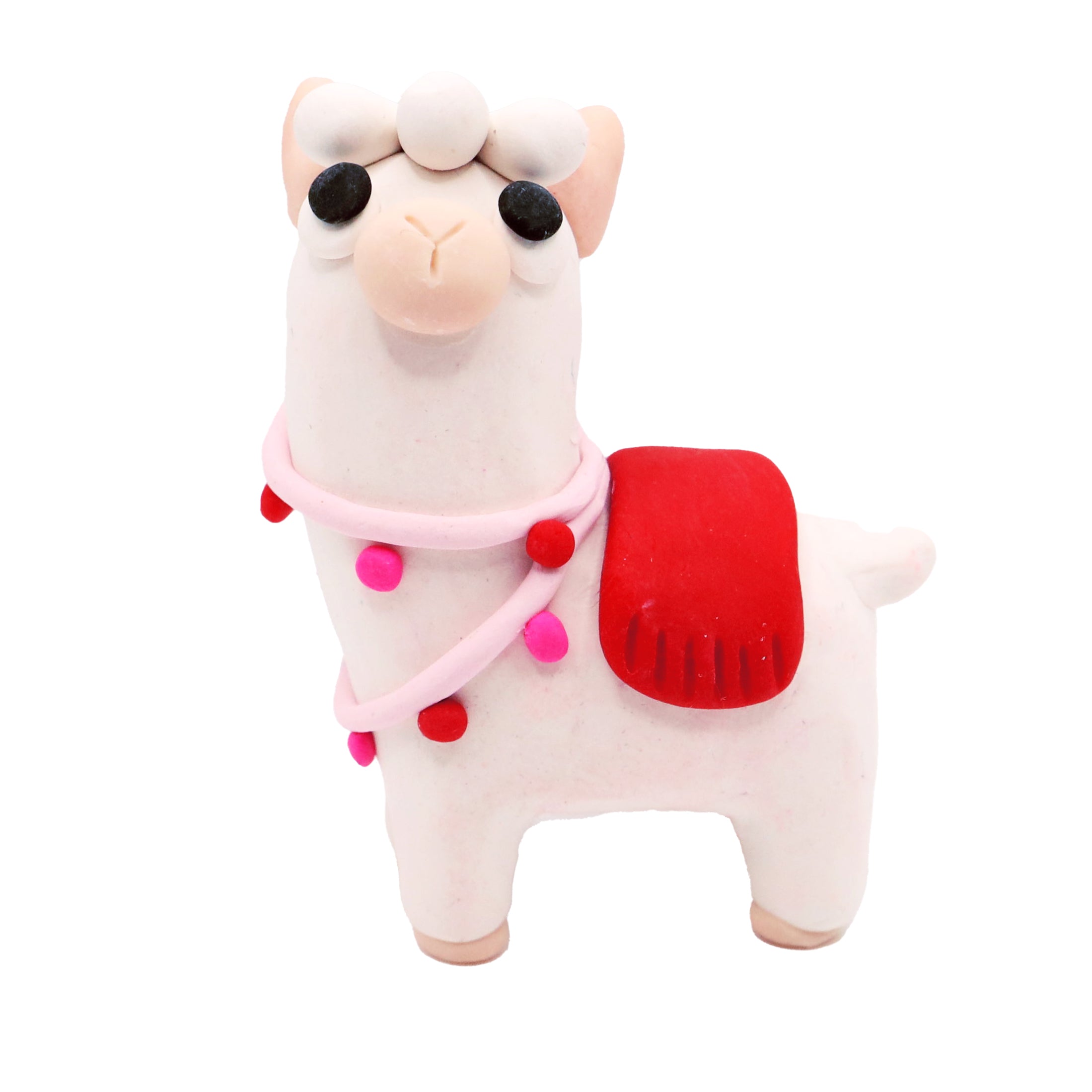 polymer clay llama with a red pouch and pink scarf on a white background