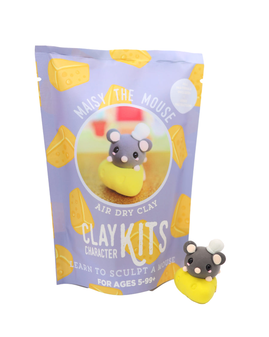 Clay kit packaging with a mouse character and purple background